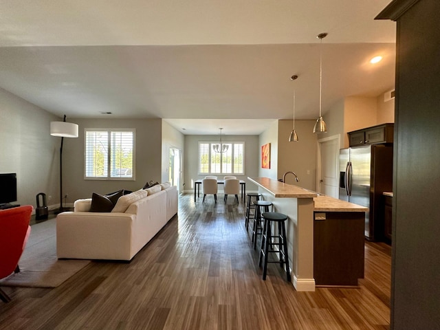 living room featuring dark wood-type flooring