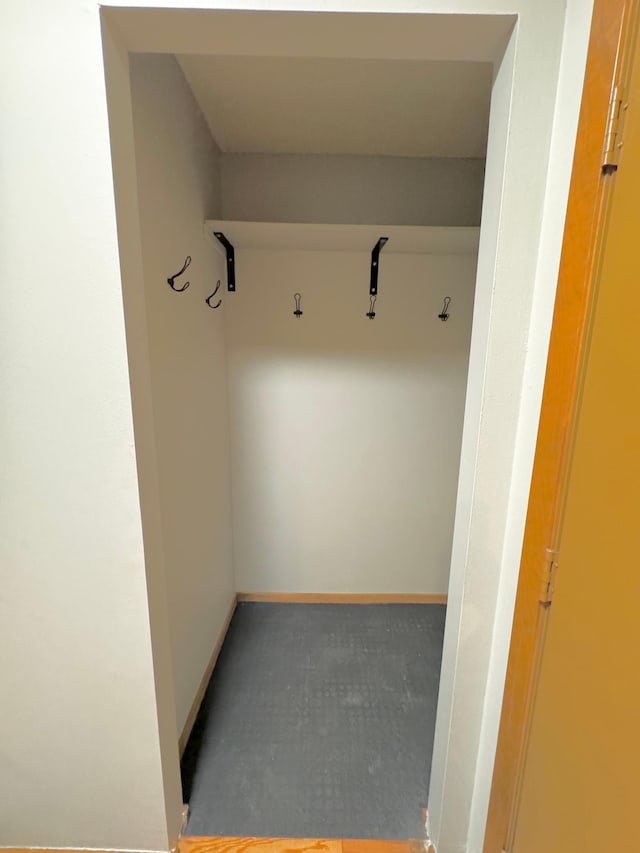 mudroom with concrete flooring