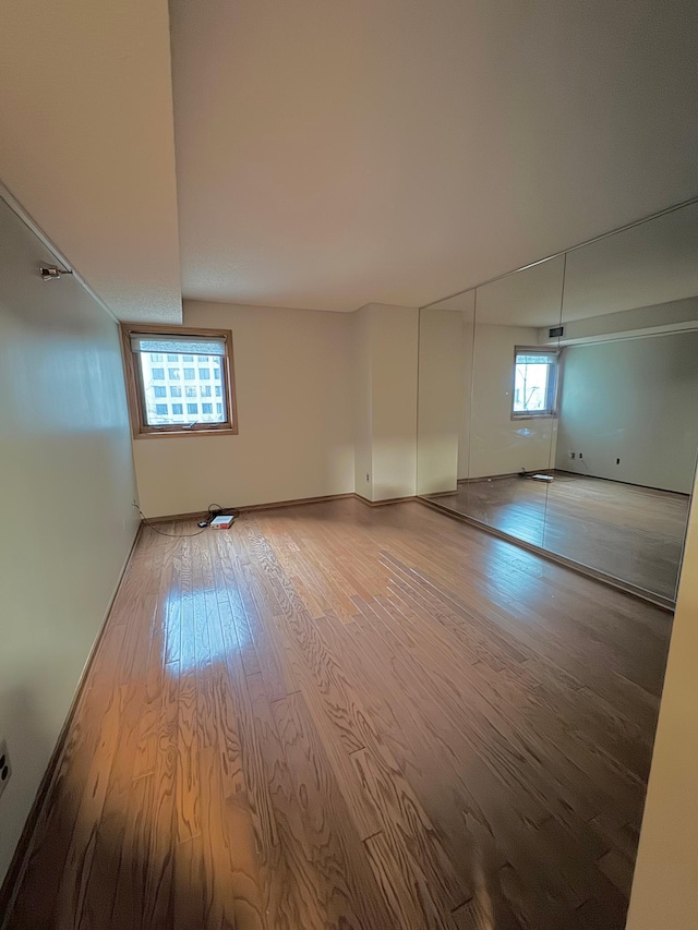 interior space with hardwood / wood-style floors