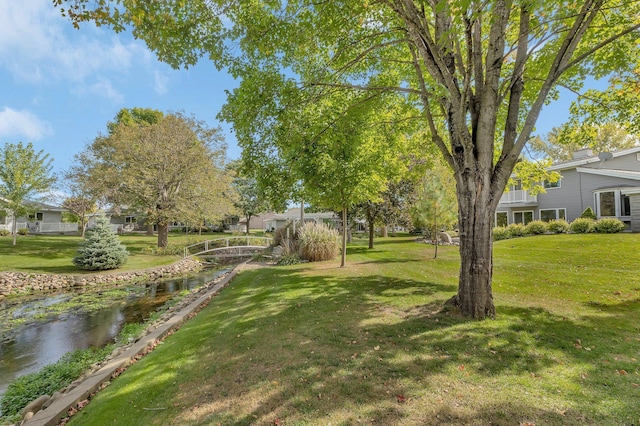 view of yard featuring a water view