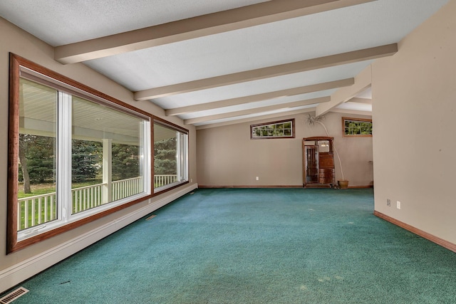 carpeted spare room featuring a baseboard radiator, lofted ceiling with beams, and a textured ceiling