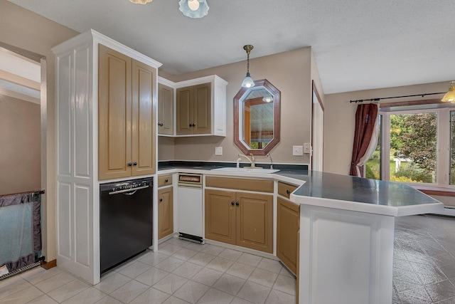 kitchen with black dishwasher, kitchen peninsula, sink, and hanging light fixtures