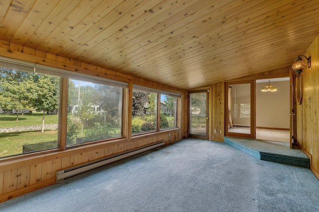 unfurnished sunroom with baseboard heating, an inviting chandelier, vaulted ceiling, and wooden ceiling