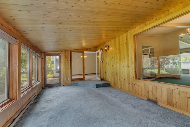 unfurnished sunroom with lofted ceiling, wood ceiling, and a baseboard radiator