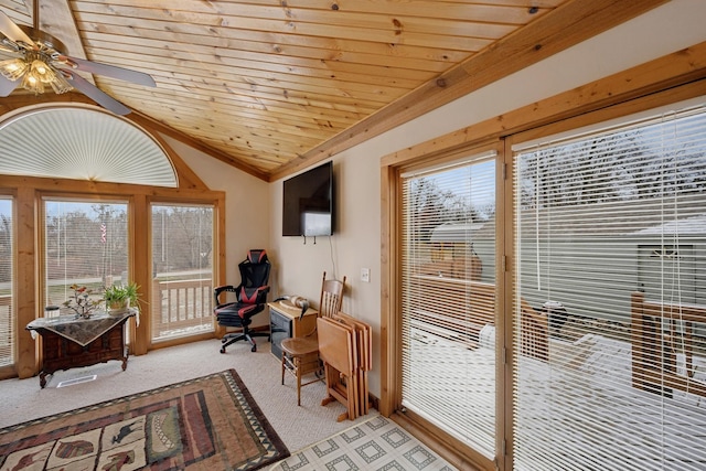 interior space with light colored carpet, wood ceiling, and vaulted ceiling