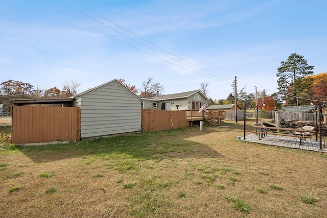 view of yard featuring a wooden deck