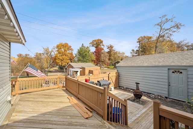 deck with an outbuilding