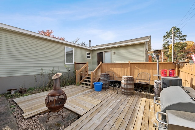 deck featuring a fire pit