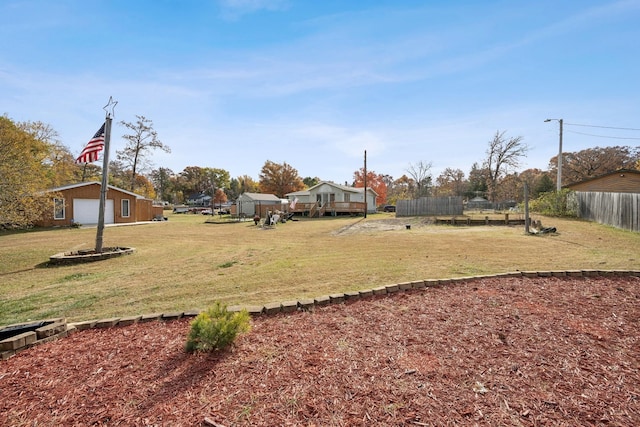 view of yard featuring a garage