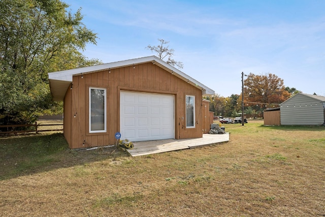 garage with a lawn