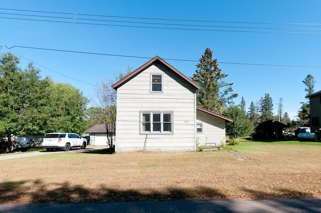 exterior space featuring a lawn