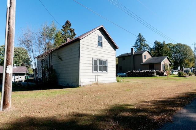 exterior space featuring a lawn