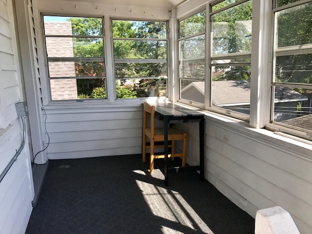 unfurnished sunroom with a healthy amount of sunlight