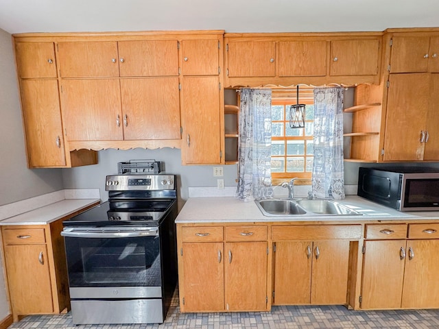 kitchen with appliances with stainless steel finishes and sink