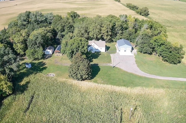 birds eye view of property with a rural view