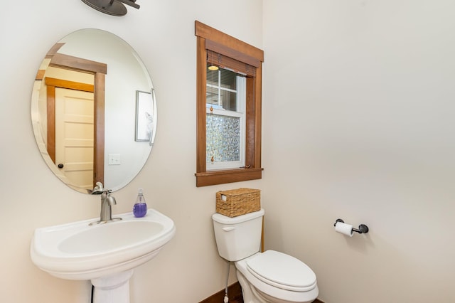 bathroom featuring sink and toilet