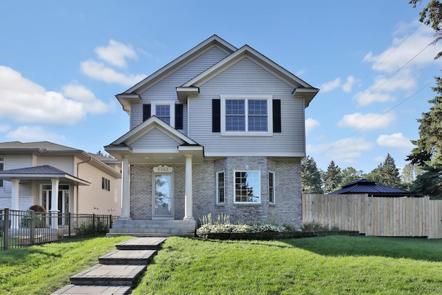 view of front of home featuring a front yard