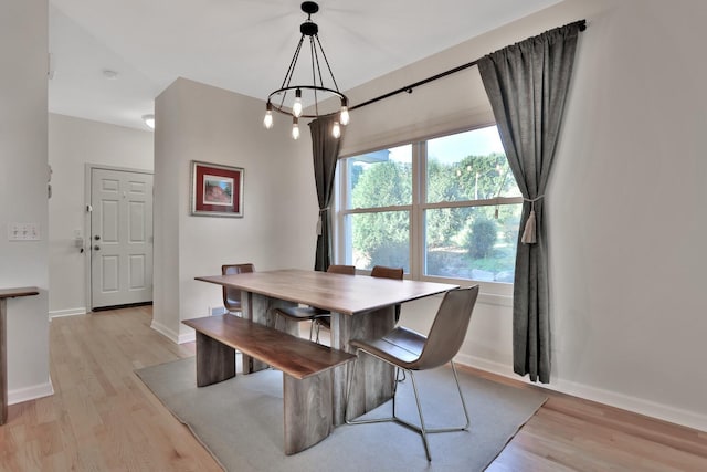 dining area featuring light wood-type flooring