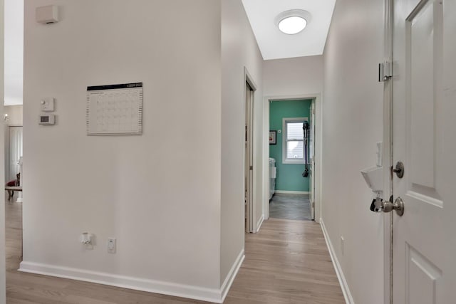 corridor featuring light wood-type flooring