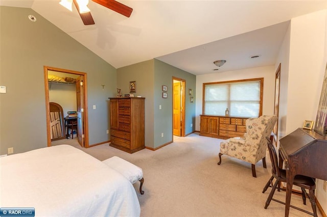 carpeted bedroom with ceiling fan, lofted ceiling, and a closet