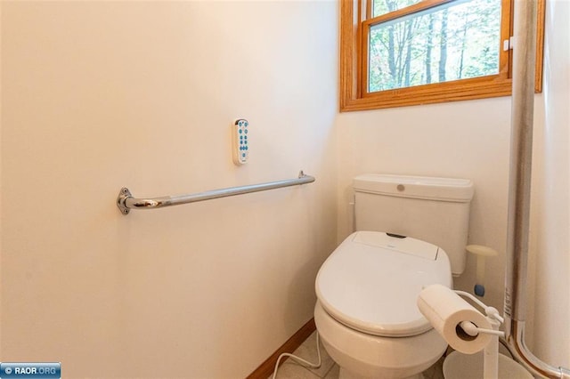 bathroom featuring toilet