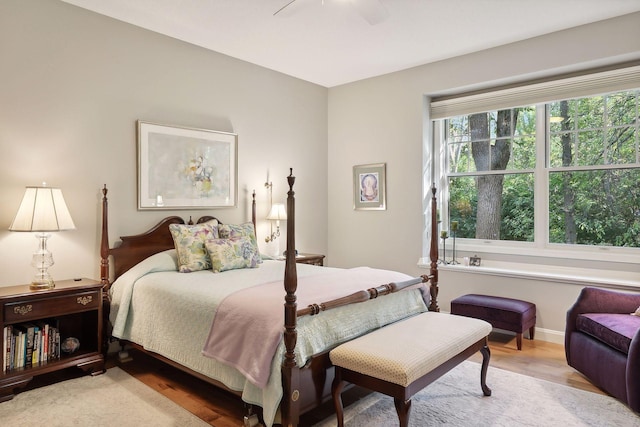 bedroom featuring ceiling fan and hardwood / wood-style flooring