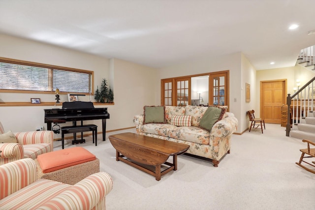 carpeted living room with french doors