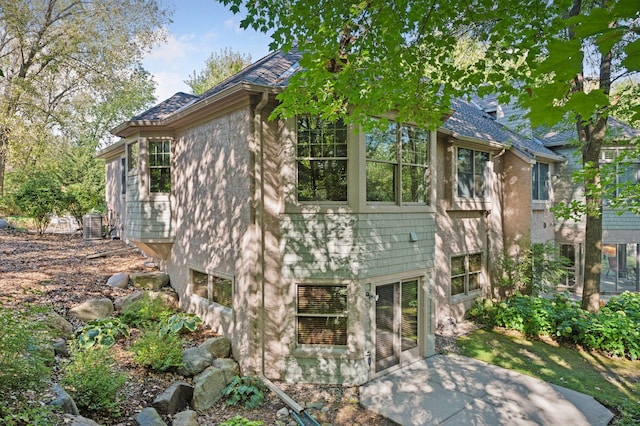 view of home's exterior with a patio