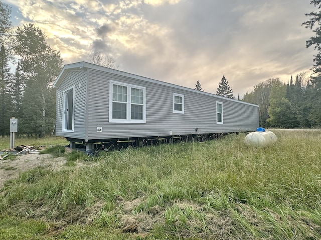 view of property exterior at dusk