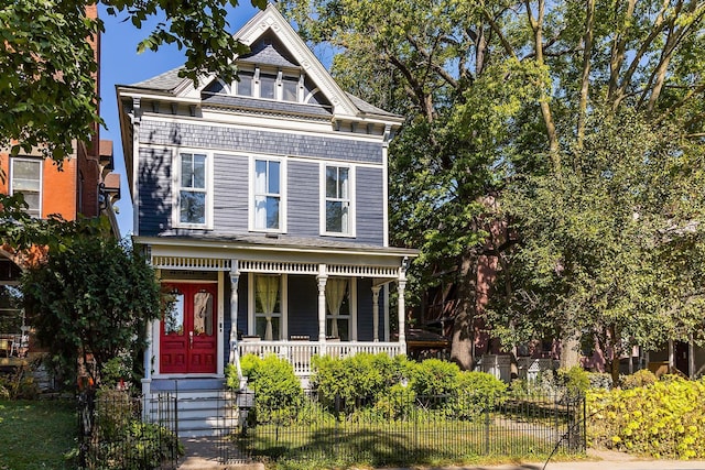 victorian house featuring covered porch