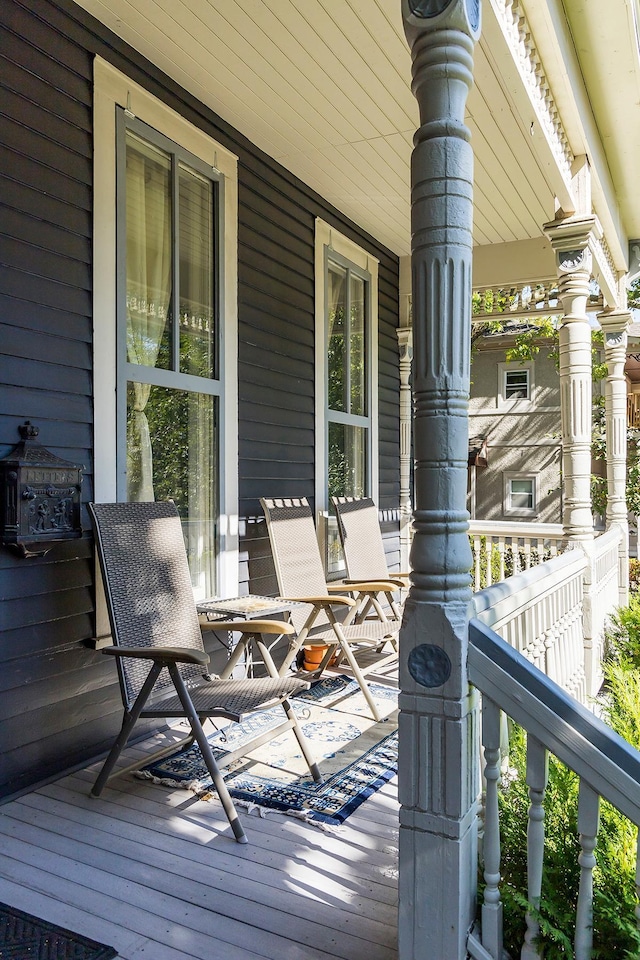 wooden terrace with covered porch