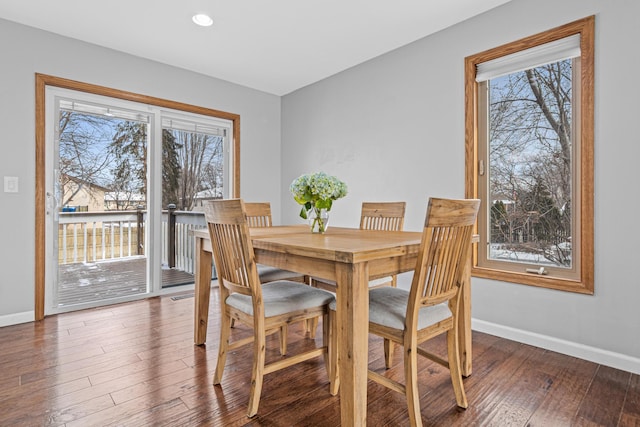 dining space featuring recessed lighting, baseboards, and hardwood / wood-style flooring