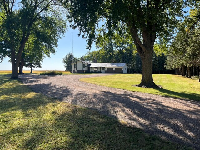 exterior space featuring a front yard