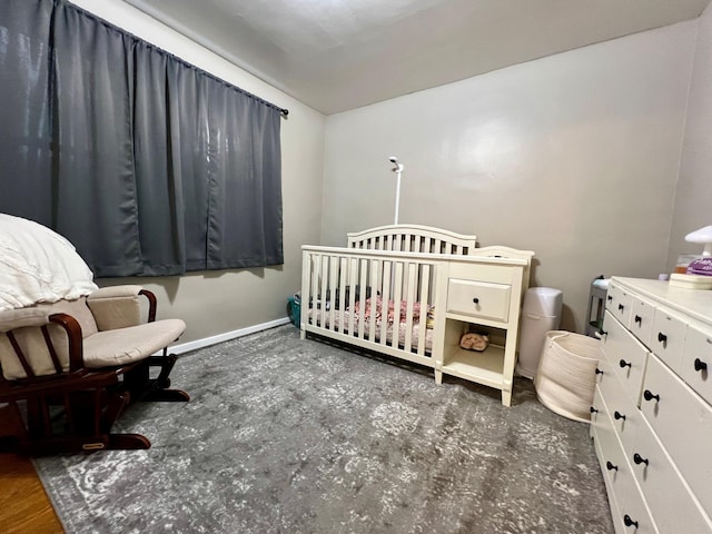 bedroom with a nursery area