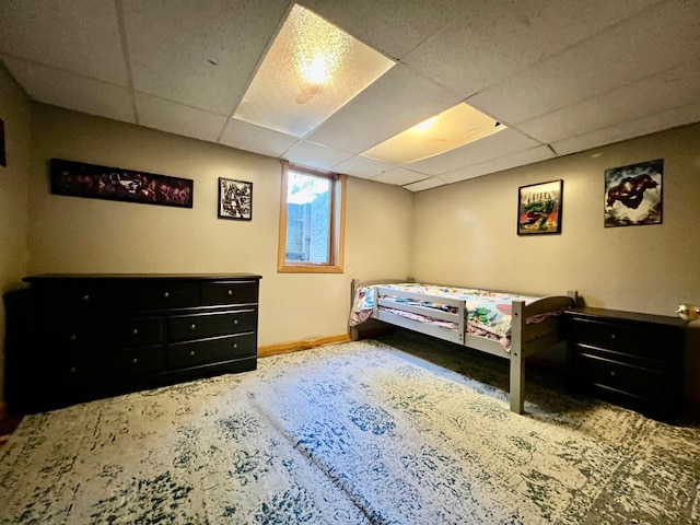 bedroom with a drop ceiling