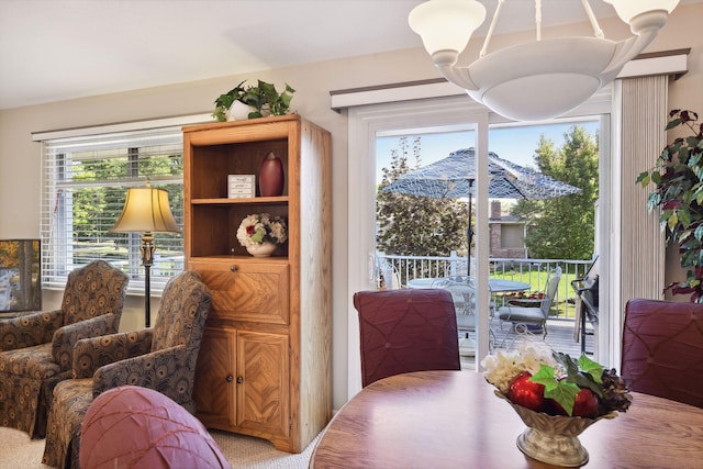 view of carpeted dining space