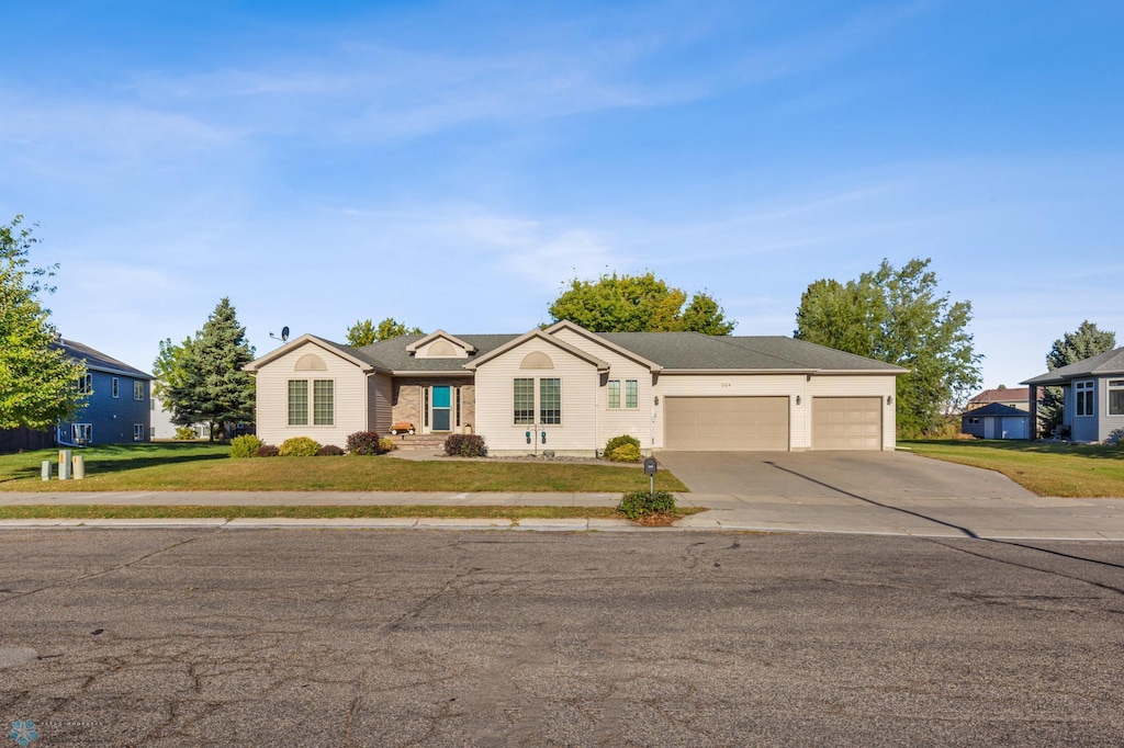 single story home featuring a garage