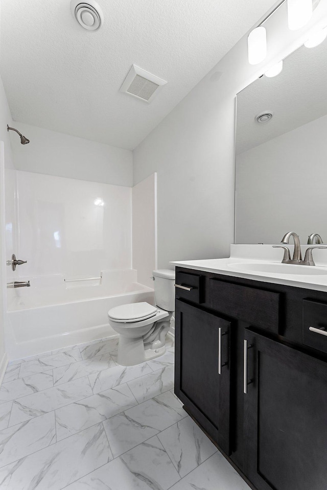 full bathroom featuring vanity, toilet, and shower / bath combination