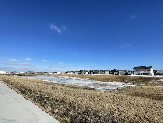 view of water feature with a residential view