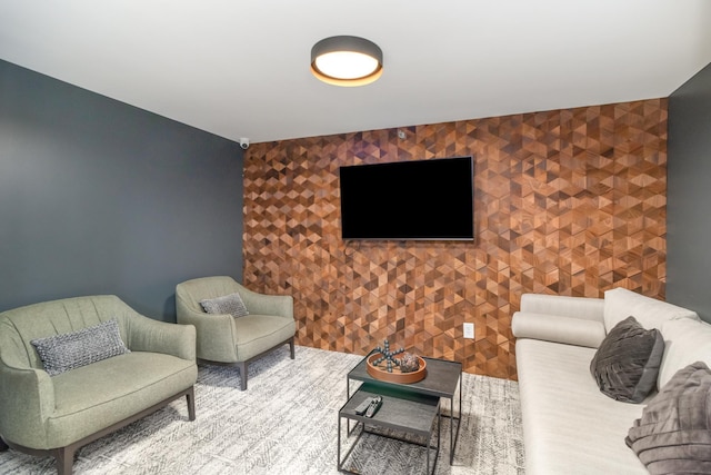 living room featuring an accent wall