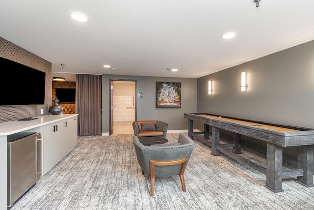 rec room featuring baseboards and recessed lighting