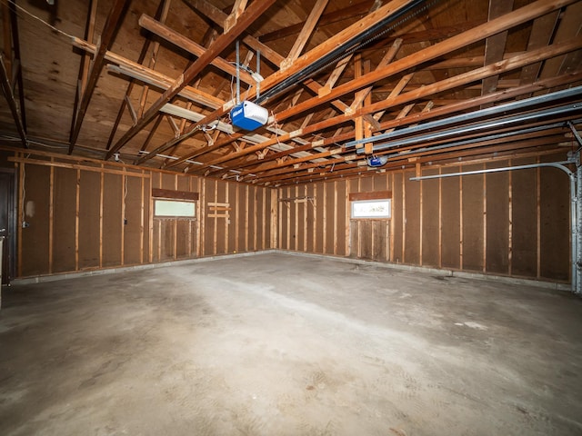 garage featuring a garage door opener