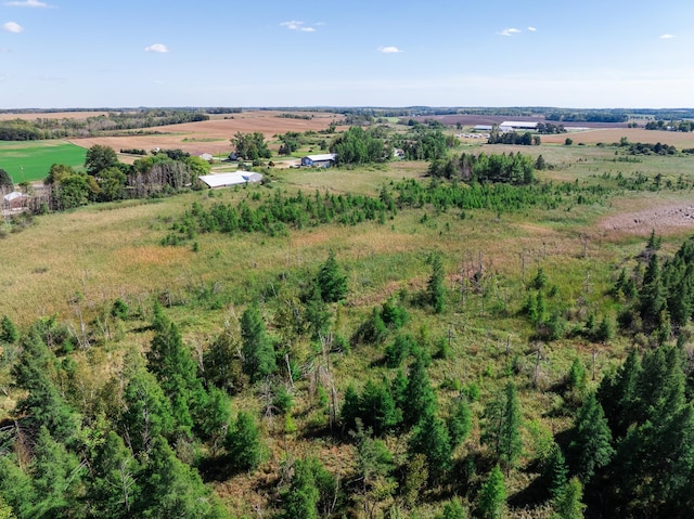 birds eye view of property featuring a rural view