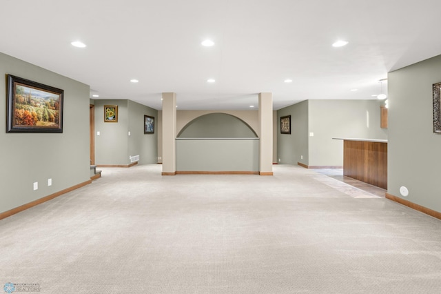 interior space featuring light colored carpet