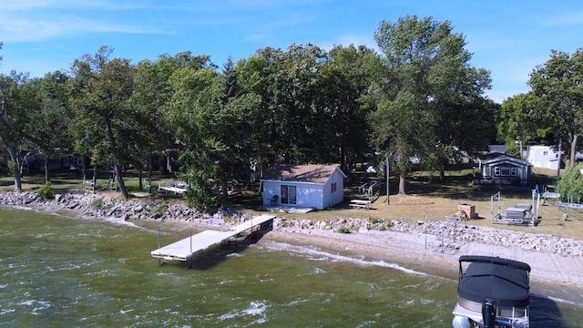 exterior space with a water view