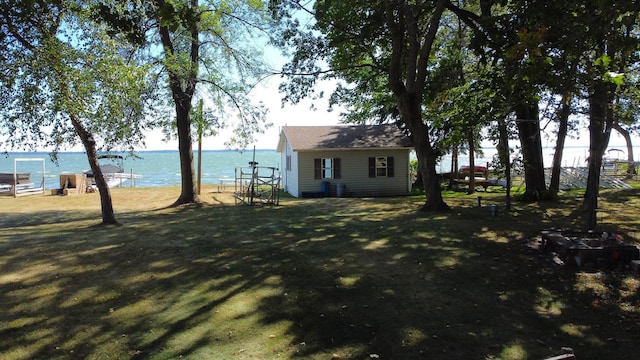 view of yard with a water view