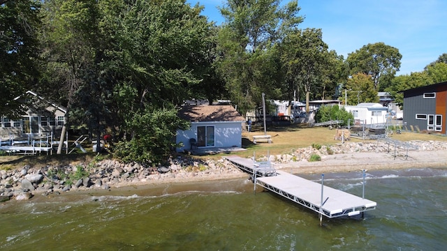 dock area with a water view