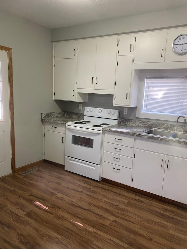 kitchen featuring white cabinetry, dark hardwood / wood-style floors, white electric range oven, and sink