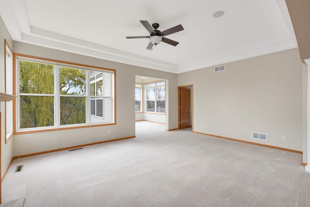 empty room with light carpet and ceiling fan