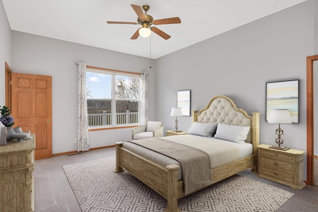 carpeted bedroom featuring ceiling fan